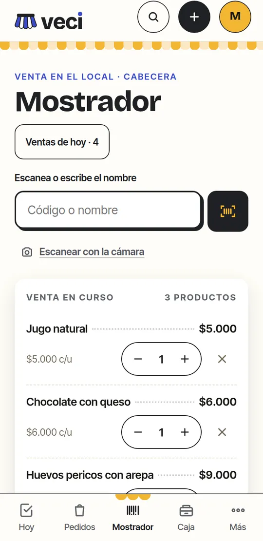 Venta en curso en el mostrador de Veci con tres productos